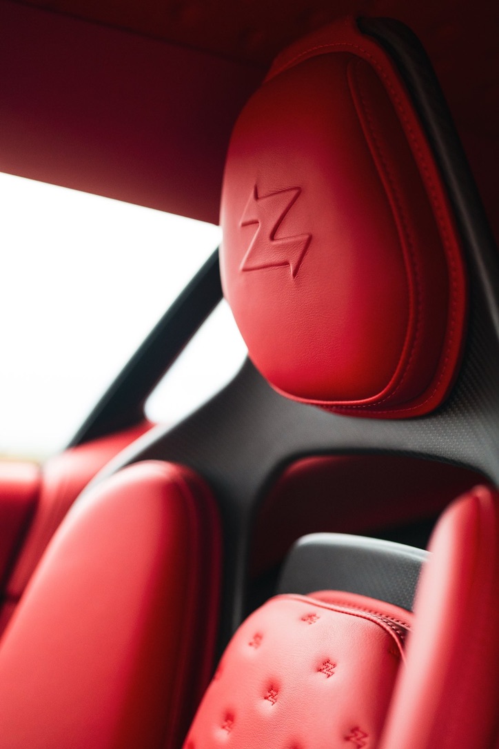 Aston Martin red leather seat and carbon-fibre shell